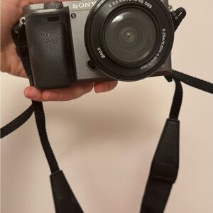Sony Black Digital Camera with Large Lens and Textured Grip